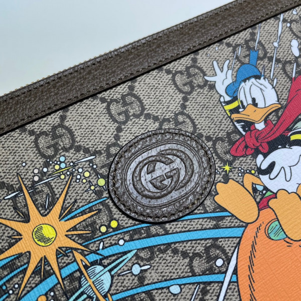 disney x G*u*i donald duck clutch