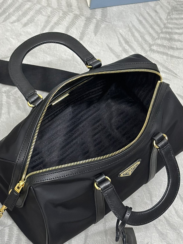 Pra*a re-nylon and saffiano leather top-handle bag